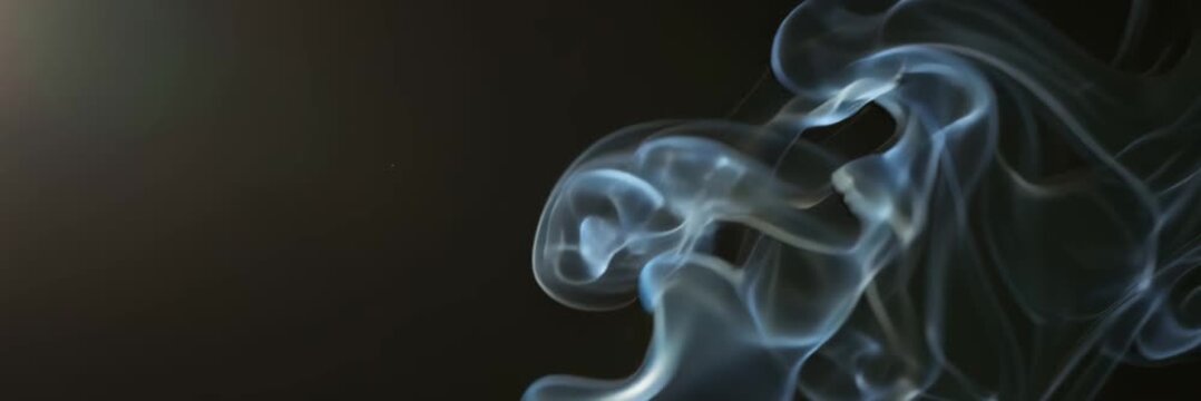 Blue smoke swirling on dark background, website banner in wide format with copy space, abstract vapor movement, modern atmospheric design.