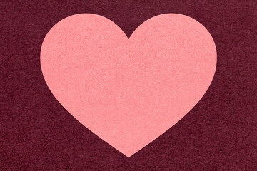Fototapeta premium Pink heart on dark wine paper texture background with copy space for Valentines Day banner, template or greeting card