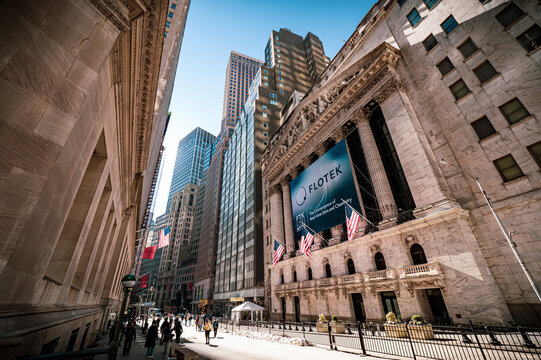 Scenic view of the NYSE on Wall Street, the heart of Lower Manhattan's Financial District, in New York City, NY, USA, on a sunny but cold winter day