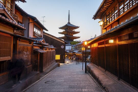 Yasaka dori historic street in the old town with traditional Japanese houses, five-story Yasaka Pagoda of the Buddhist Hōkanji Temple at the back, evening mood, blue hour, Higashiyama, Kyoto, Japan