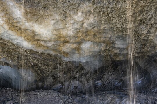 Meltwater at a glacier cave, underground glacier stream, Castner Glacier, Delta Range, Alaska Range, Richardson Highway, Alaska, USA