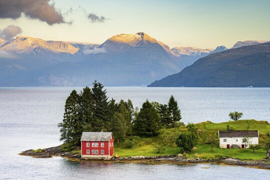 Omaholmen Island in Hardangerfjord, small island with colourful houses, Hardanger region, Vestland, Norway