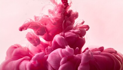 Naklejka premium pink ink in water creating a beautiful and mesmerizing abstract pattern