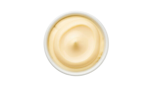 Isolated bowl of thick, creamy mayonnaise sauce on a plain surface ready to serve or add to recipes
