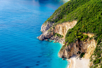 Naklejka premium Aerial view on beautiful green coast island Corfu with cliffs, Ionian Sea, Greece, Stelari Beach. Greek Island Vacation Background