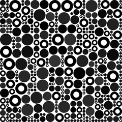 Vector Illustration Y2k Seamless pattern of monochrome circles and rings. Abstract bubble texture with varying sizes and grayscale tones.