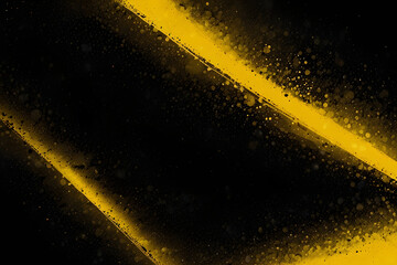 Fototapeta premium Vibrant yellow streaks on a dark background with glowing particles and sparks flying around