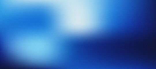 Fototapeta premium Deep blue gradient background with bright spotlight glow and grain texture