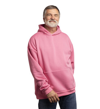 Caucasian smiling bearded mature man wearing pink hoodie on transparent background. Standing indoors