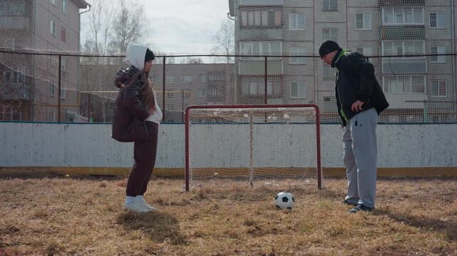opponents engage in playful competition, amicable rivalry unfolds as friends face each other at net, lighthearted game of tennis showcasing friendly competition between male friends near net