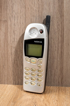 Vintage Nokia 5110 mobile phone showing retro communication technology