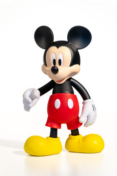 Mickey Mouse action figure character standing on white background