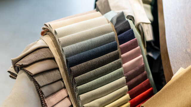 curtain fabric samples in the curtain salon. exhibition samples, advertising, interior design, home comfort. curtain fabric and fabric for furniture and upholstery