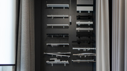 samples of various options of cornices for curtains. ceiling cornice, wall cornice, hidden cornice. store salon curtains © drk.muse