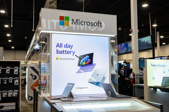 Microsoft Surface laptop and tablet display in electronics store. Toronto, Canada - February 7, 2026.