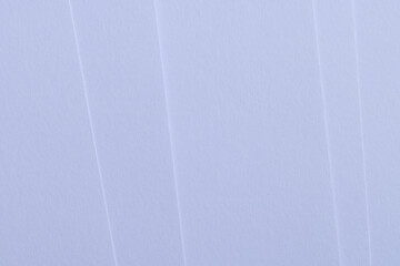 Minimalist Abstract White Paper Layers with Soft Shadows,High-angle view of layered white textured paper creating elegant diagonal lines and soft shadows. A clean, minimalist abstract background.