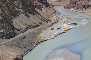 Scenic beauty of the confluence of the Indus and Zanskar Rivers, known as Sangam, is located near Nimmu village, from Leh along the Leh-Srinagar Highway, NH1. Leh, Ladakh, India.