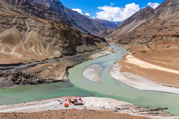Scenic beauty of the confluence of the Indus and Zanskar Rivers, known as Sangam, is located near Nimmu village, from Leh along the Leh-Srinagar Highway, NH1. Leh, Ladakh, India.