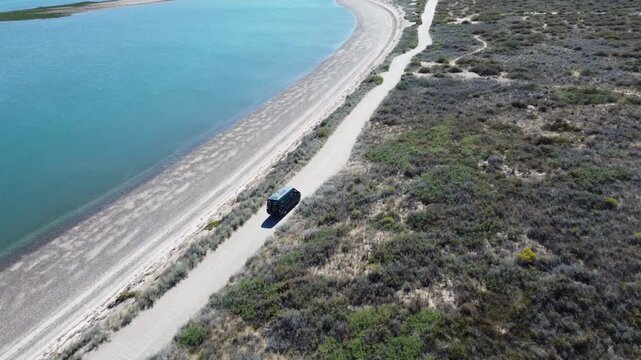 Camper Vans going to by Turquoise Waters in Punta Perdices Patagonia