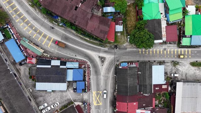 Aerial drone view of road intersection in Kubang Semang town