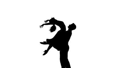 Man lifting a dancing woman in a joyful silhouette.