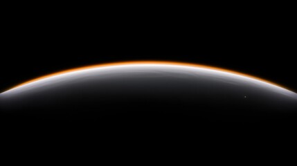 Obraz premium A planet with a thin atmosphere and a bright orange glow around its edge.