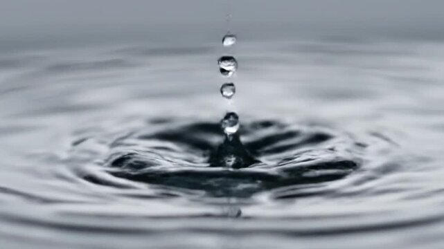 Serene VIDEO capturing ultra slow motion water wave splashing on surface and rebounding upward in 4K high quality