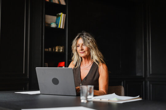 Woman using laptop computer
