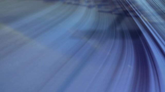 Curved blue bands starting soft blurring, stretching and sharpening into streaks, suggesting motion