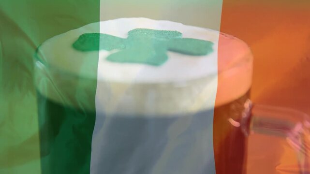 Tricolour fading, camera pushing in and racking focus, revealing foam texture, shamrock and handle