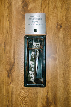 Photo booth slot with strip