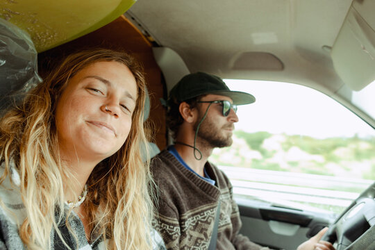 ouple traveling in a van during a surf road trip