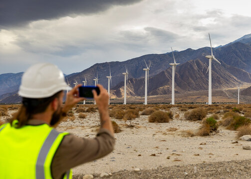 Alternative Wind Turbine Technician mobile phone photo desert