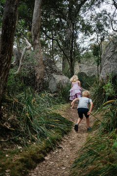 children explore boulders in the Granite Belt Region of Queensland