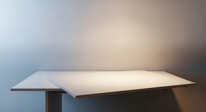 A small white table with a single light source shining on it in a room