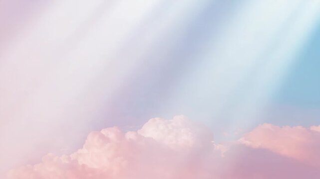 Lighting fluffy pink cloud bank at sunrise diagonal beam appearing upper right shifting pastel sky