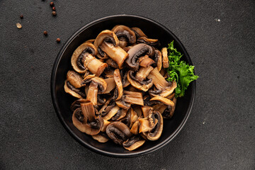 Champignon mushrooms ready to eat tasty snack fresh gourmet food background on the table rustic food top view copy space keto and paleo diet vegetarian and vegan food marketing concept photo