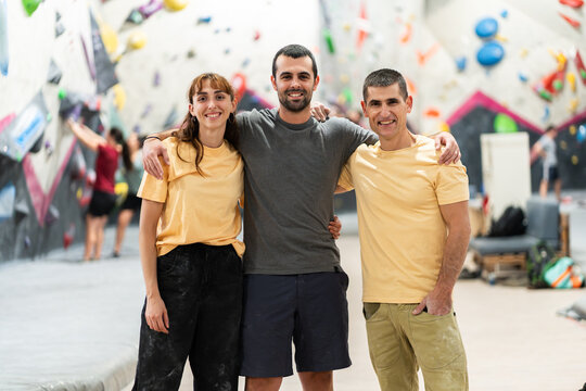 Group of friends posing together at bouldering gym