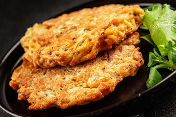 Hash browns potato fritters draniki main course food preparation tasty snack fresh delicious gourmet food background on the table rustic food top view copy space vegetarian and vegan food