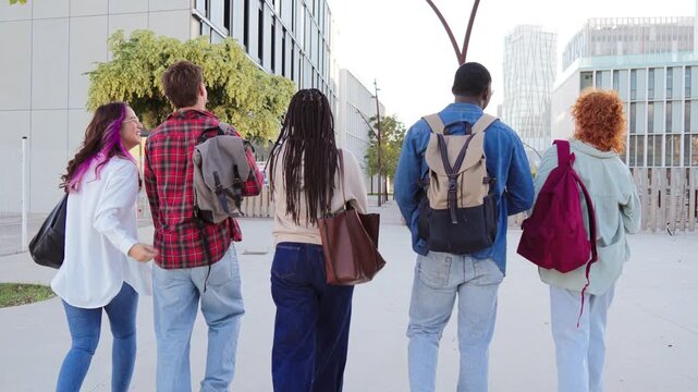 A cheerful group of friends walking closely together, sharing smiles and laughter as they enjoy their time together and strengthen their bond, creating unforgettable memories of friendship and joy.