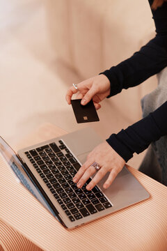 Anonymous Woman Make Online Payment with Credit Card and Laptop