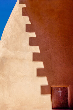 Abiquiu, New Mexico, United States. Light and shadow on an old adobe church