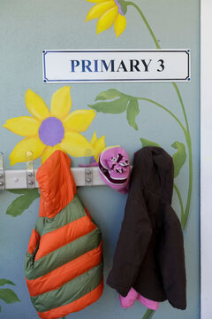 Tampa, Florida, United States. Primary school with children's coats hanging up