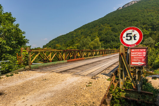 Old military bridge with weight limit sign in Bosnia and Herzegovina.