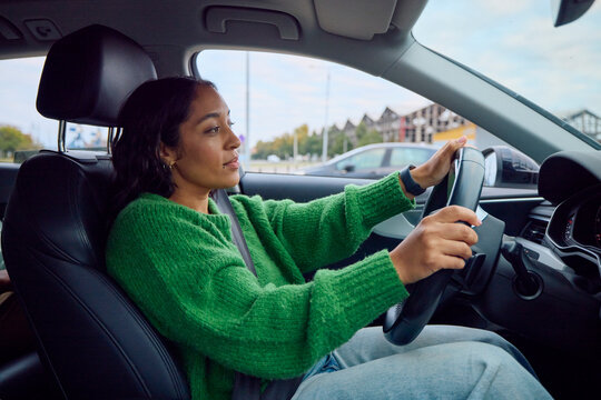 Casual woman driving a car