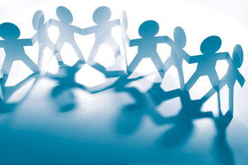 Team holding hands united