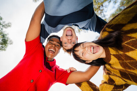 Friends make group photo outdoors