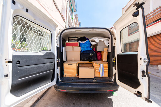 Moving Van Loaded with Boxes and Belongings