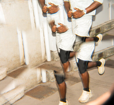 Running Indoors in Athletic Wear During Evening Fitness Routine