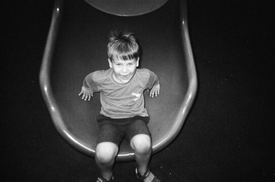 Boy sliding at the playground